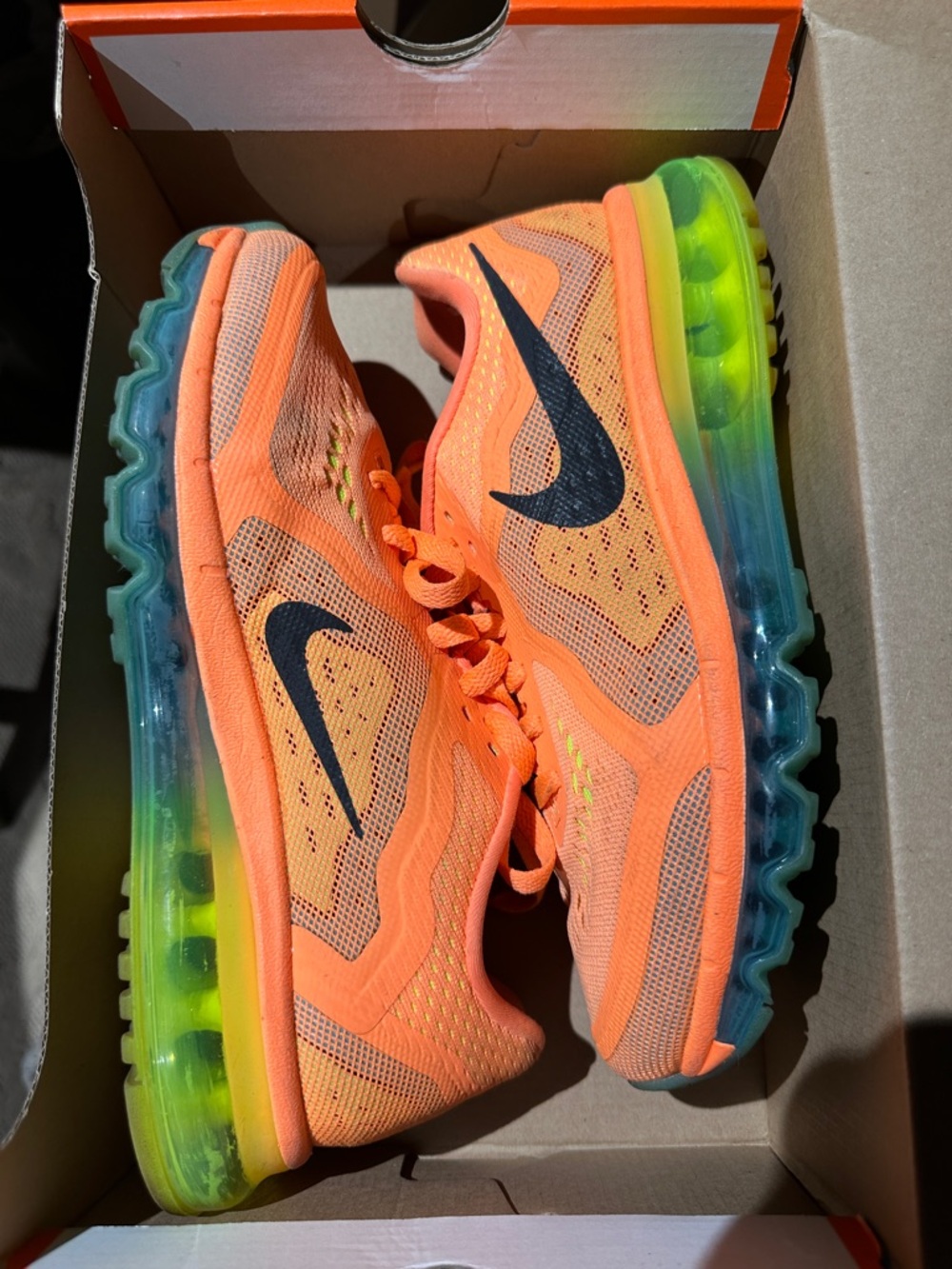 Nike Orange Running Sneakers with Black Swoosh and Rainbow Air Sole